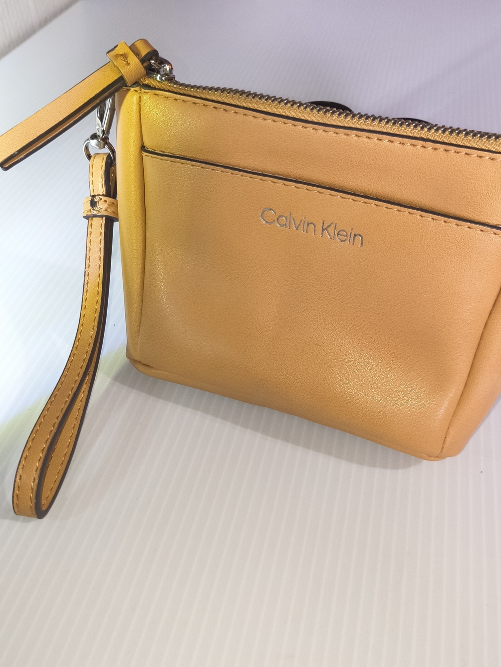 Calvin Klein Cream Leather Wristlet
